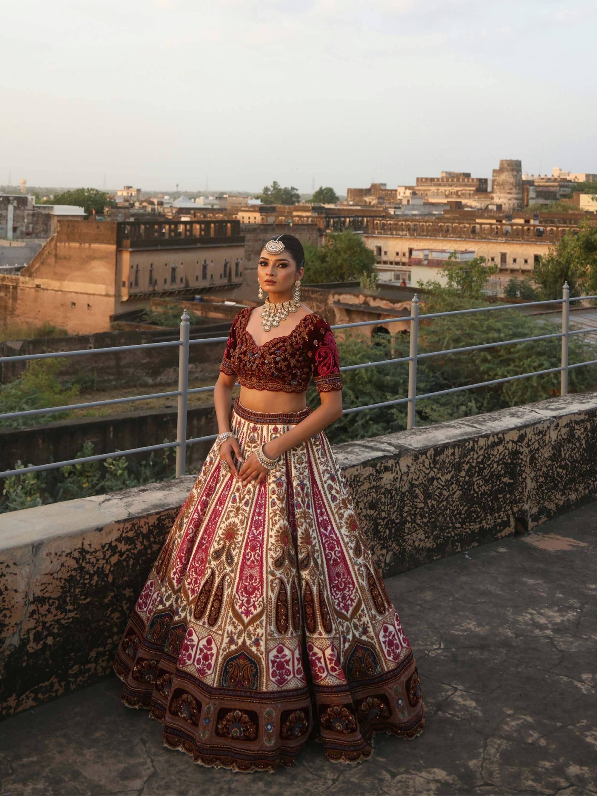 IVORY RAW SILK AND MAROON VELVET INFUSED LEHENGA