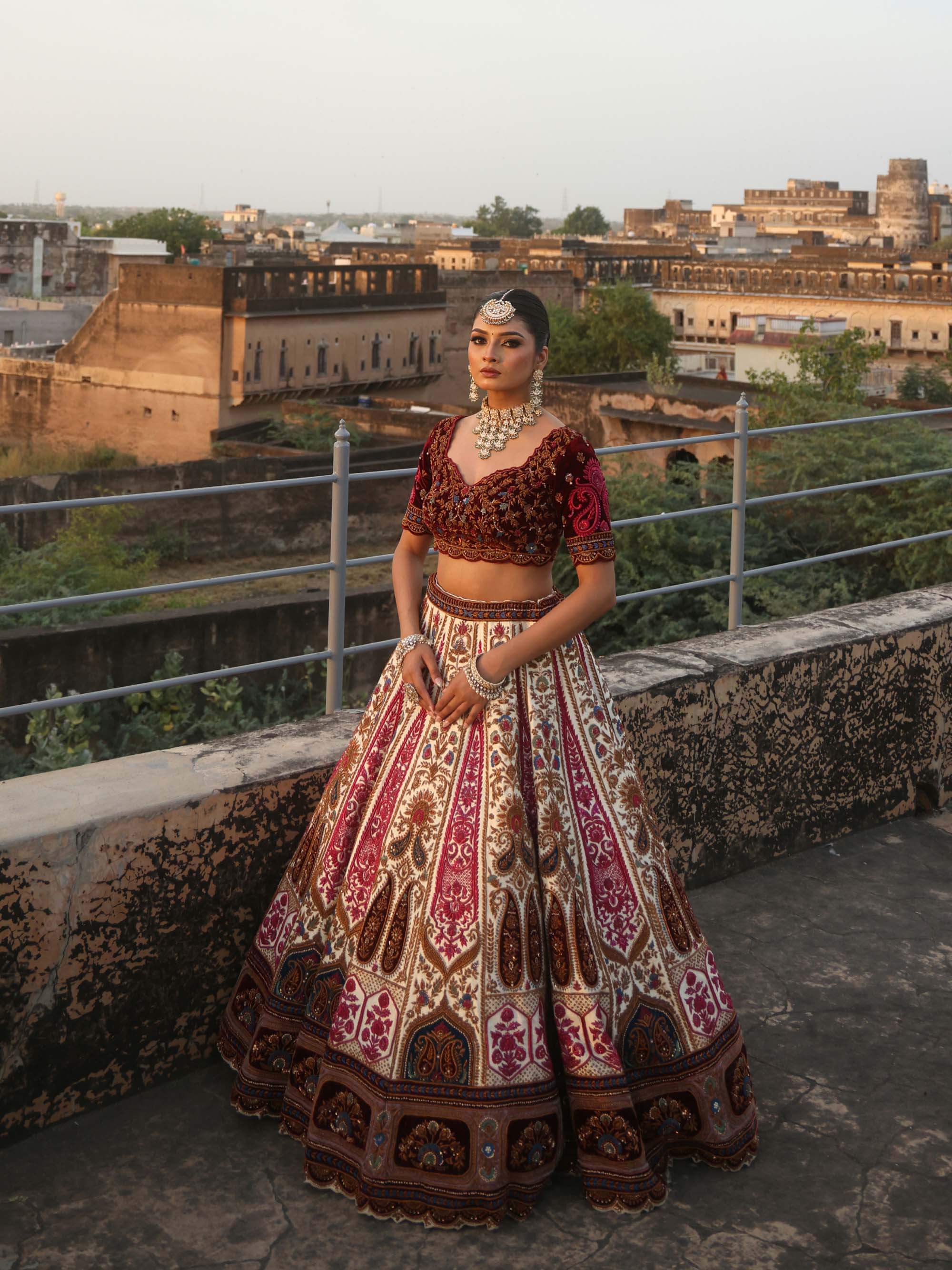 IVORY RAW SILK AND MAROON VELVET INFUSED LEHENGA
