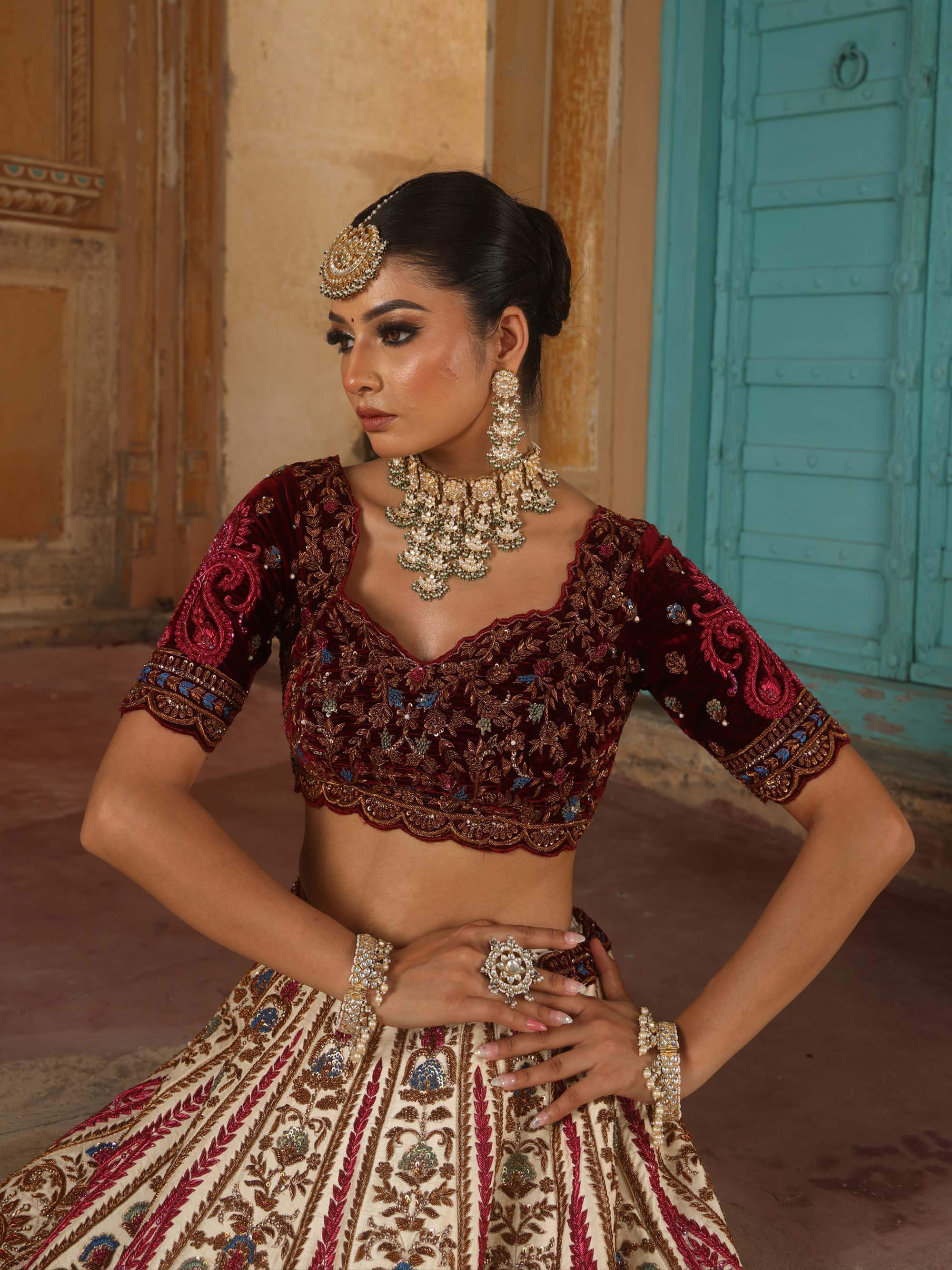IVORY RAW SILK AND MAROON VELVET INFUSED LEHENGA
