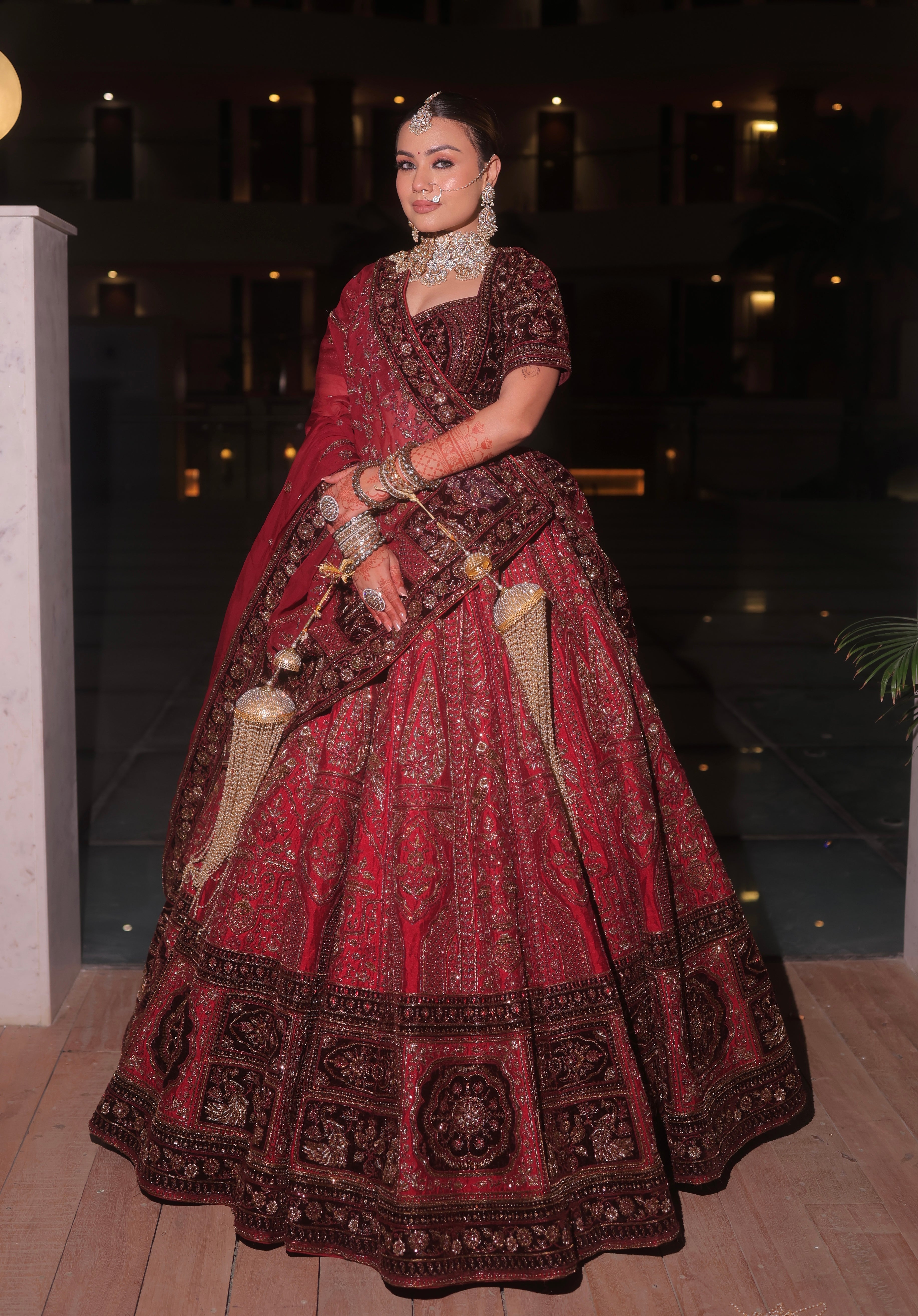 CRIMSON RED RAW SILK AND MAROON VELVET INFUSED LEHENGA