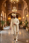 Groom wedding sherwani with detailed thread work and elegant traditional finish