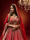 Designer red lehenga for bride with sequins and stone work
