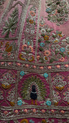 Full-length shot of a pink colour lehenga showcasing the gradient ombre effect and heritage floral embroidery.


