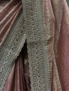 A detailed close-up shot showing the overlapping alignment of the dual scalloped borders, highlighting the neat parallel rows of tiny white pearls, golden zari work, and small glistening stones.