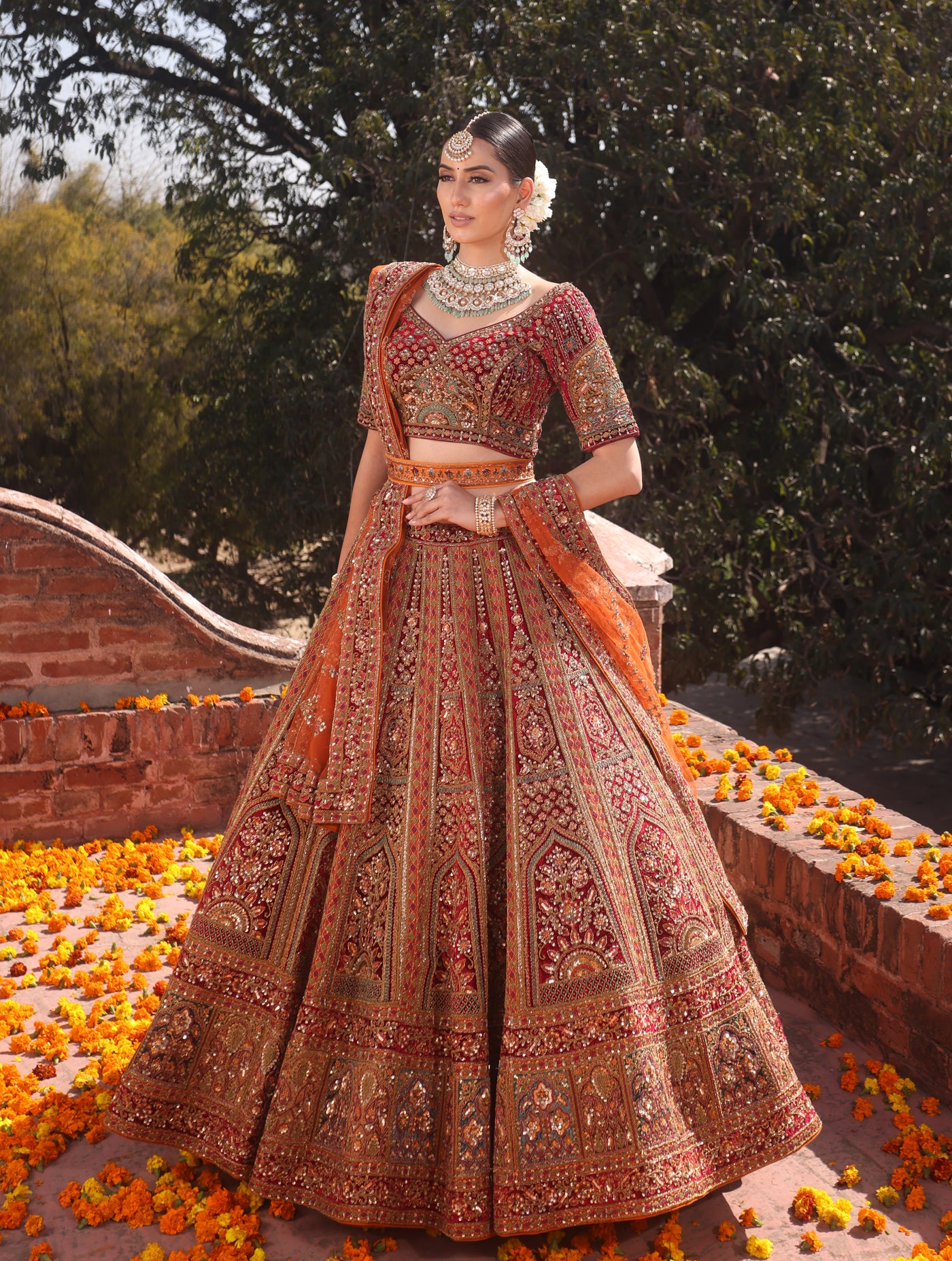 RUST RAW SILK AND MAROON VELVET INFUSED LEHENGA