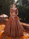 RUST RAW SILK AND MAROON VELVET INFUSED LEHENGA