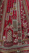 Premium red lehenga for wedding priced at 78,500 featuring traditional Indian manual craftsmanship.