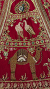 Silk red bridal lehenga with intricate zari and thread work
