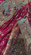 Detailed profile of the saree skirt's lower border panels, showing the wave-like layouts of high-shine sequence work and delicate resham thread art.
