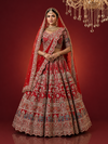 Full-length view of a wedding red bridal lehenga with a grand flare and intricate manual border work.